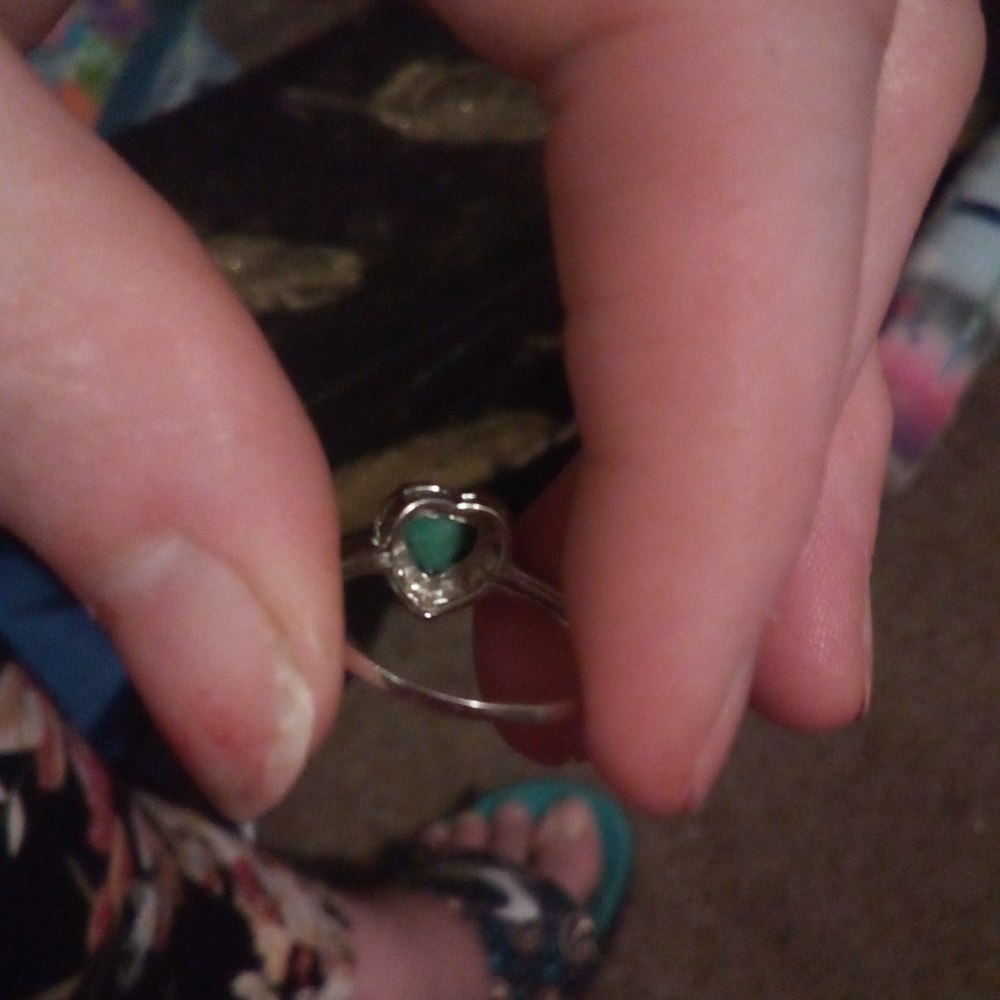 Genuine vint sterling silver ring with a genuine heart shaped gemstone. Size 7.5